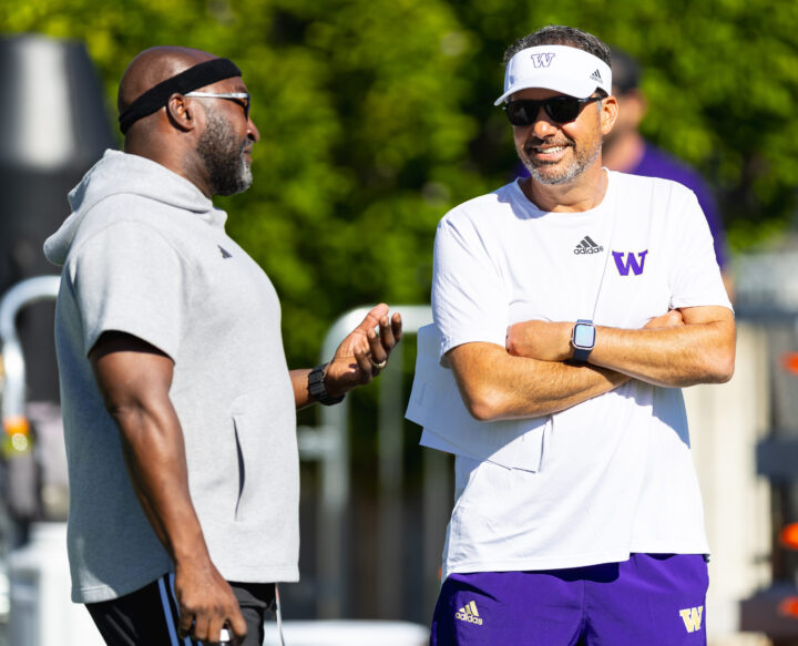 Scottie Graham talking to another Coach